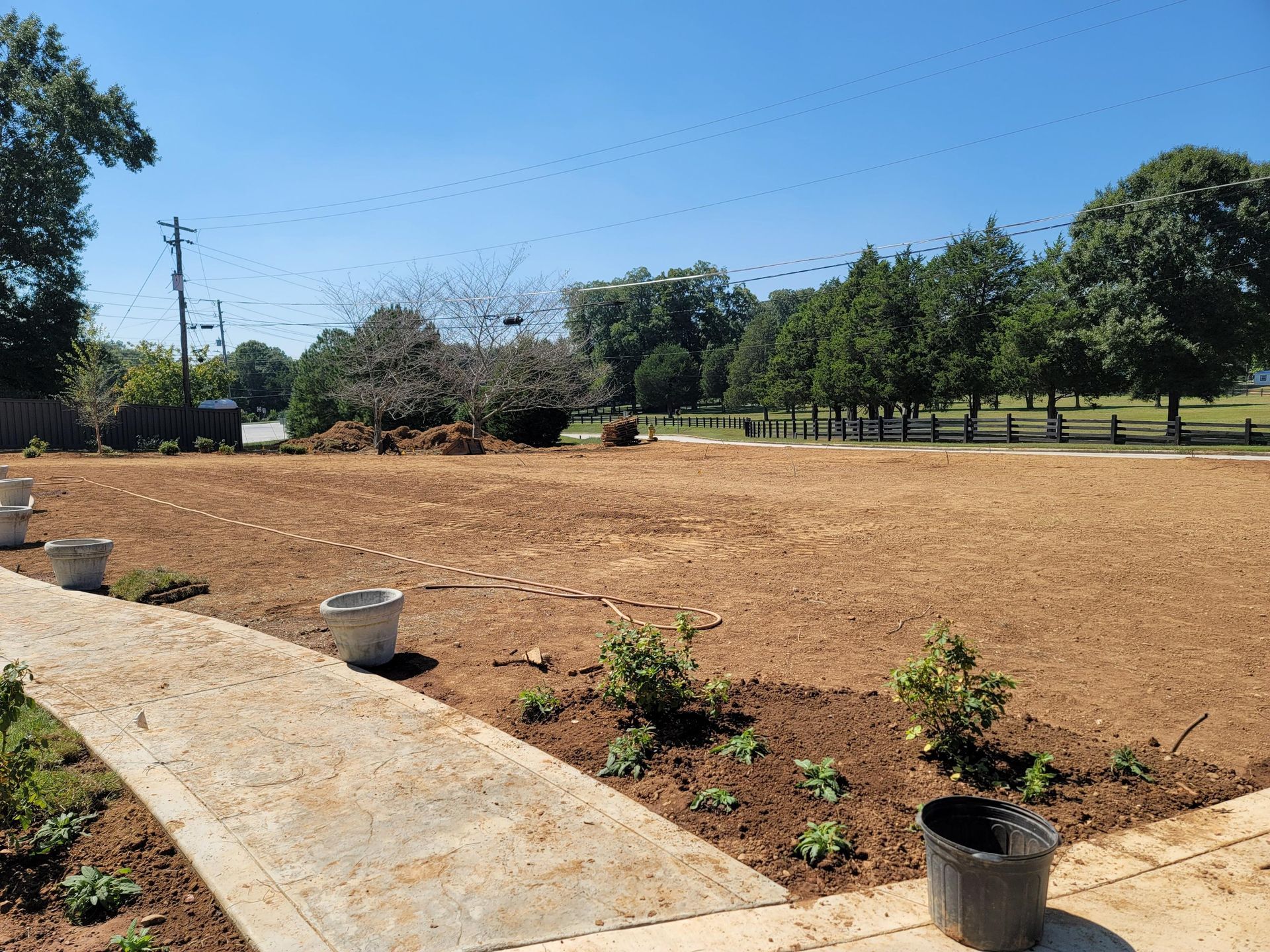 Decorative stone walkway and landscape lighting installation